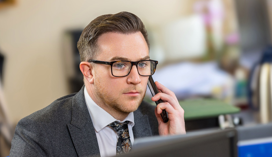 Photo of agent on the phone