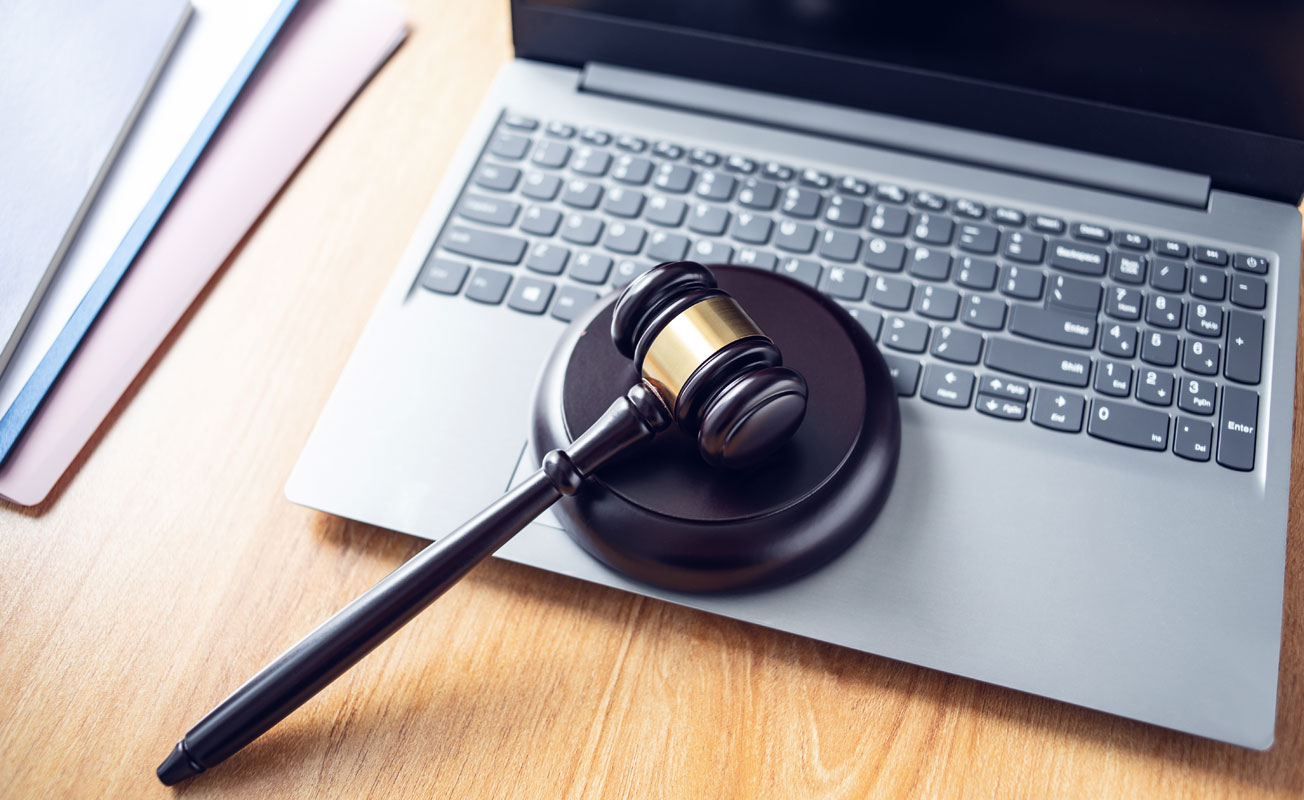 A gavel on a laptop