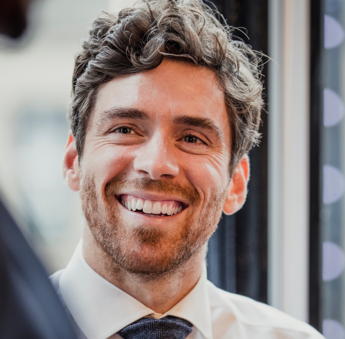 Photo of a man smiling